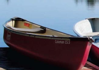 2015 Discover Trent Lakes cover image of a red canoe at a wood dock