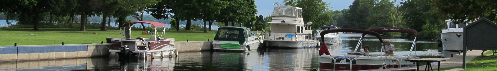 Various sized and types of motorboats moored at Lock 31